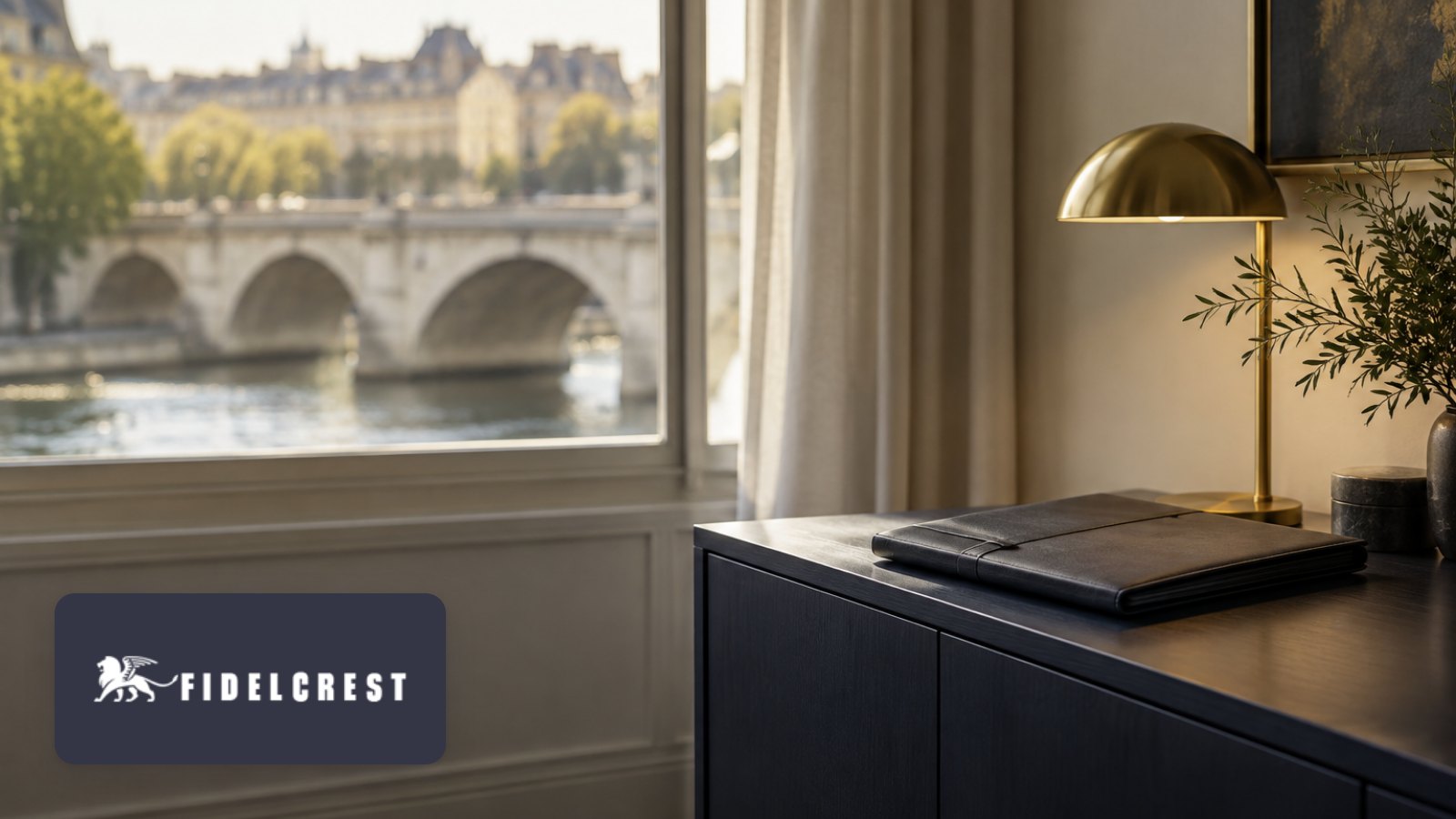 Fidelcrest logo with laptop in a cinnamon-toned fireside nook